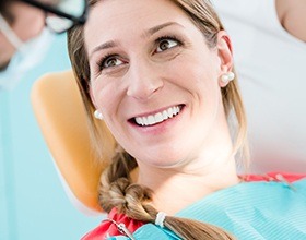 Smiling woman in dental chair