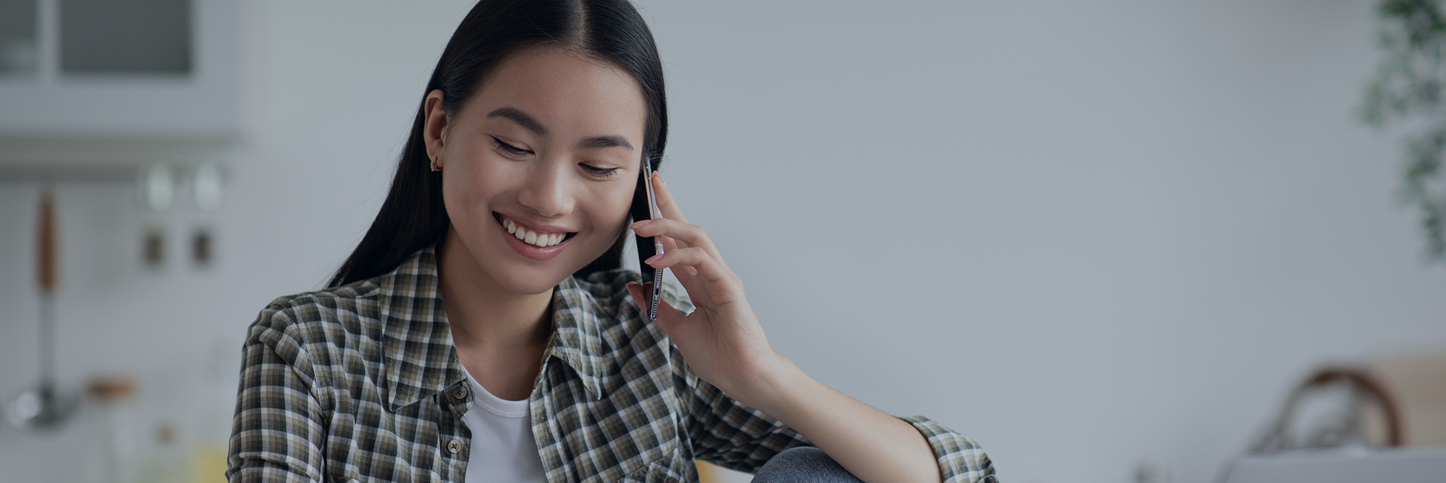 Young woman talking on the phone