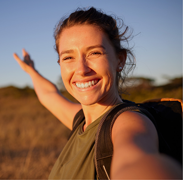 Woman smiling in the sunlight