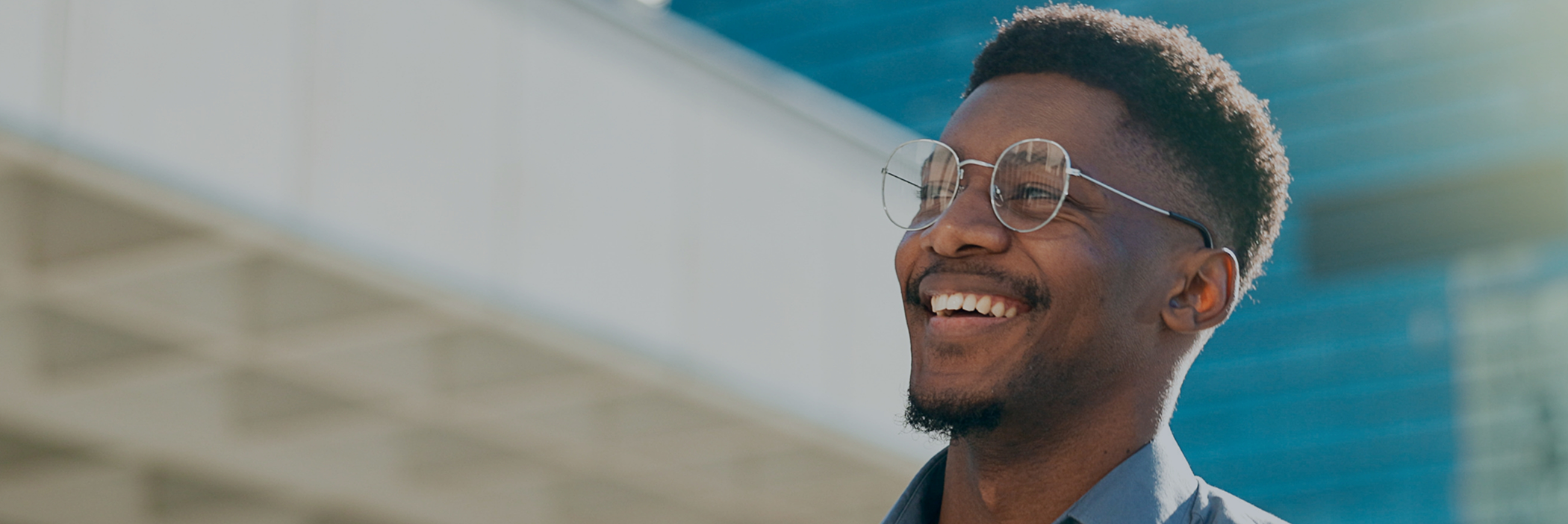 Man smiling in the sunlight after dental bonding in Boca Raton