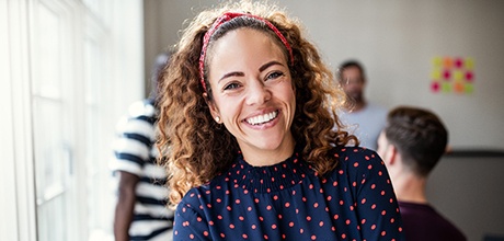 A woman happy with her tooth-colored fillings in Boca Raton