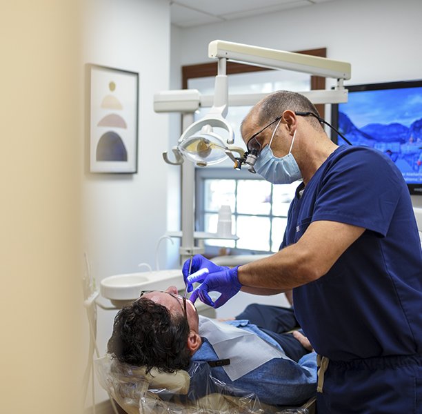 Boca Raton dentist Doctor Alberto Lamberti treating a patient