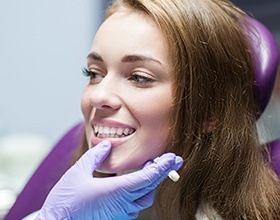 Woman receiving dental checkup and teeth cleaning