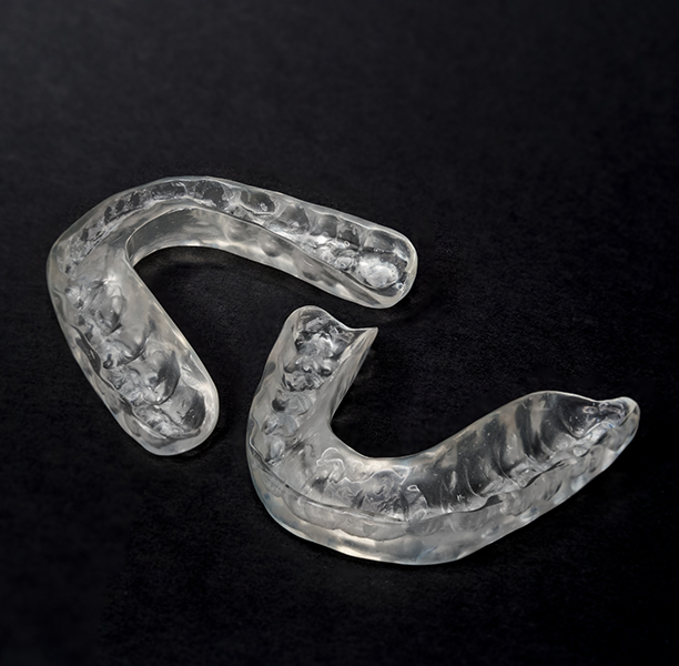 Two clear nightguard trays