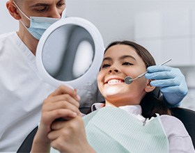 Teen smiling in the dental chair