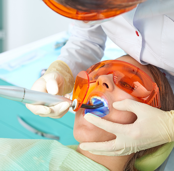 Dental patient getting tooth-colored fillings