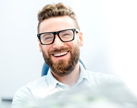 man smiling after getting teeth whitening in Boca Raton