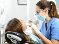 patient getting dental checkup in Boca Raton