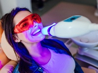 woman getting teeth whitening in Boca Raton