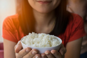 Bowl of rice, which can help maintain white teeth