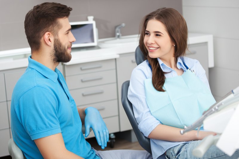 patient talking to dentist in Boca Raton