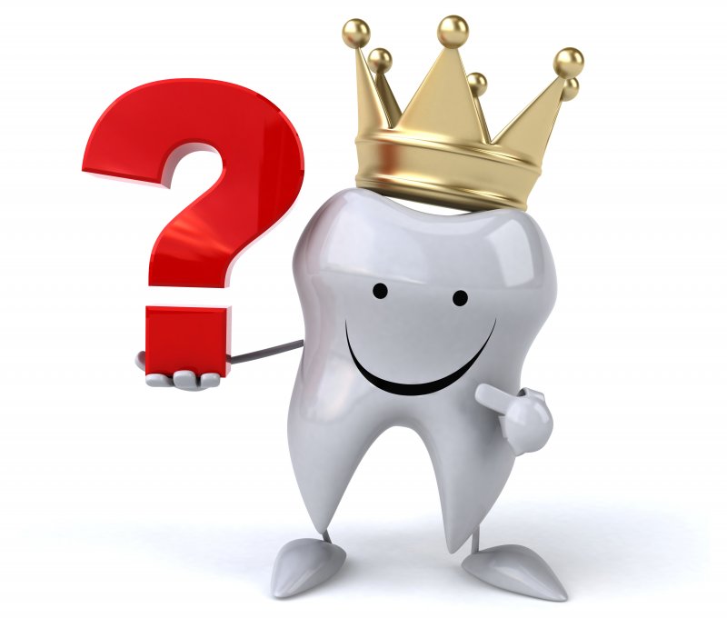 Tooth wearing crown and holding giant question mark